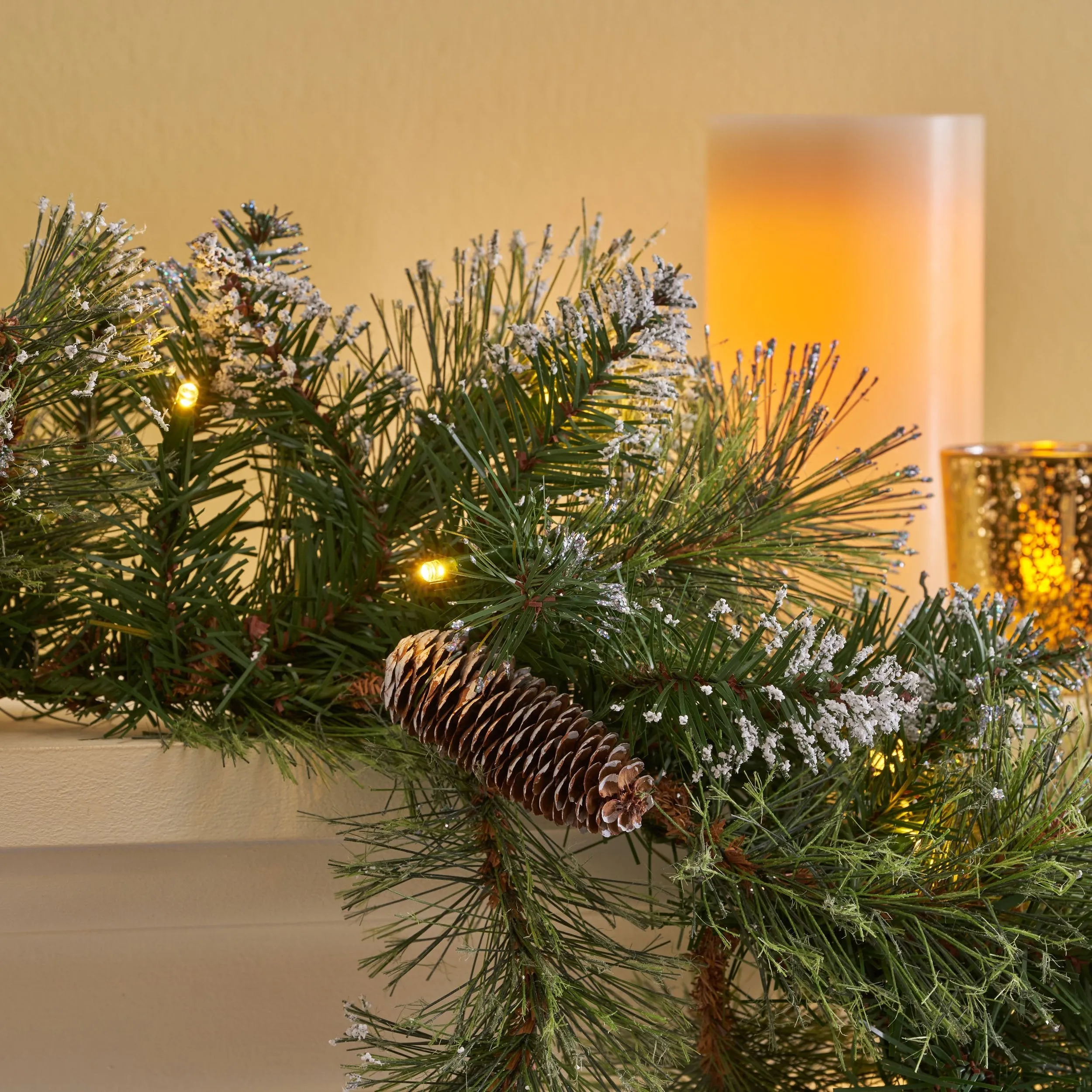 9-foot Cashmere Pine and Mixed Needle Pre-Lit Warm White LED Artificial Christmas Garland with Snow and Glitter Branches and Frosted Pinecones - NH393703